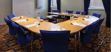 Wharf Room at Holiday Inn Express Limehouse, U-shape setup for meetings and discussions.